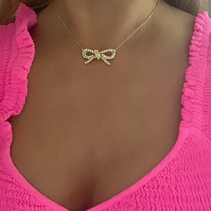 The Crystal Bow Necklace in Gold