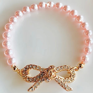 The Crystal Bow Pearl bracelet in Gold- 2 color options