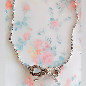 The Crystal Bow Necklace in Silver